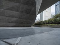 the building is shaped like a tunnel with a curved sidewall that wraps a very large area