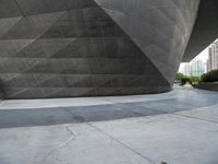 the building is shaped like a tunnel with a curved sidewall that wraps a very large area