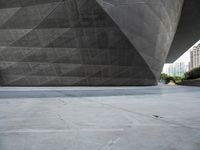 the building is shaped like a tunnel with a curved sidewall that wraps a very large area