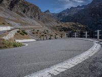Curving Asphalt Road in Italian Alps