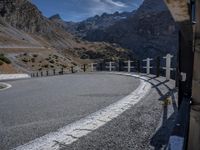 Curving Asphalt Road in Italian Alps
