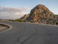 Curving Asphalt Road in Majorca, Spain at Dawn