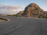 Curving Asphalt Road in Majorca, Spain at Dawn