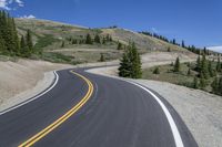 Curving Asphalt Road in Mountain Scenery