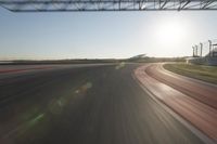 Curving Highway Through Clear Sky