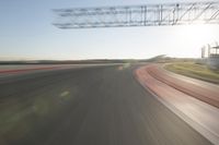 Curving Highway Through Clear Sky