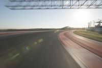 Curving Highway Through Clear Sky