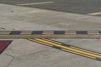 the runway is ready for take off at this airport scene of an empty area with two lines painted on it