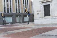 a man walking across a sidewalk in a red shirt and brown jacket towards a building