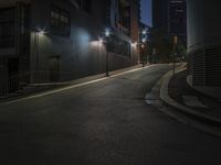 street lights illuminate streets on a dark city night during the day in a urban area