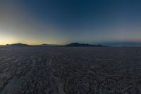 Dark Desert Mountains Surrounding Salt Lake: A Nature Packshot