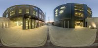 a reflection of a building and the two circular building next to each other in the same angle