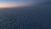 Dawn Aerial View: Open Space Above Clouds