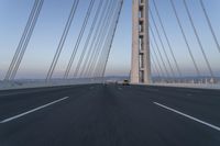 Dawn: Architecture of a Blue Suspension Bridge