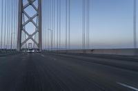 Dawn on Asphalt Road with Cable-stayed Bridge