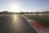 Dawn on the Asphalt Road: Field POV Shot