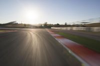 Dawn on the Asphalt Road: Field POV Shot