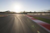 Dawn on the Asphalt Road: Field POV Shot