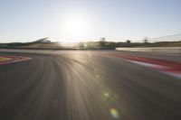 Dawn on the Asphalt Road: Field POV Shot