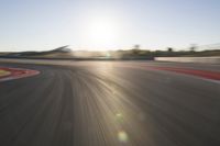 Dawn on the Asphalt Road: Field POV Shot