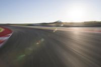 Dawn on the Asphalt Road: Field POV Shot