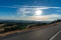 Dawn on the Asphalt Road: A Mountain View