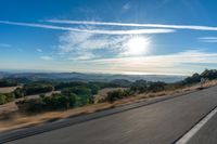 Dawn on the Asphalt Road: A Mountain View