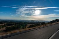 Dawn on the Asphalt Road: A Mountain View