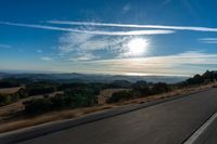 Dawn on the Asphalt Road: A Mountain View