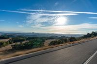 Dawn on the Asphalt Road: A Mountain View