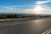 Dawn on the Asphalt Road: A Mountain View