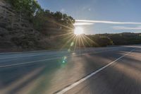 Dawn on Asphalt Road: A Picturesque Rural Landscape