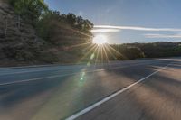 Dawn on Asphalt Road: A Picturesque Rural Landscape