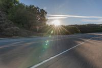 Dawn on Asphalt Road: A Picturesque Rural Landscape