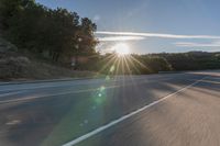 Dawn on Asphalt Road: A Picturesque Rural Landscape