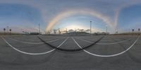 a 360 - vision image of a parking lot at the airport with a circular array of white lines