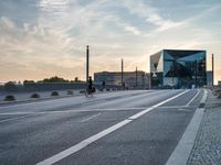 Dawn in Berlin: Walking Along the Asphalt Road in Europe