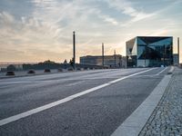 Dawn in Berlin: Walking Along the Asphalt Road in Europe