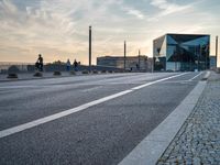 Dawn in Berlin: Walking Along the Asphalt Road in Europe