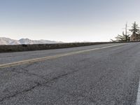 Dawn Over California Highway: Breathtaking Landscape with Majestic Mountains