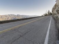 Dawn Over California Highway: Breathtaking Landscape with Majestic Mountains