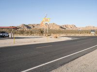 Dawn in California: Motel and Asphalt Road