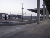 Dawn City Street: A Walkway Amidst Clouds