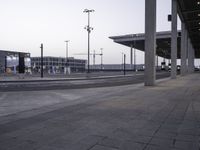 Dawn City Street: A Walkway Amidst Clouds