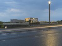 Dawn on the City Streets of Berlin: Water Reflections and Urban Lights