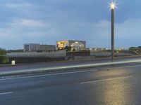 Dawn on the City Streets of Berlin: Water Reflections and Urban Lights