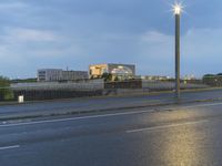 Dawn on the City Streets of Berlin: Water Reflections and Urban Lights