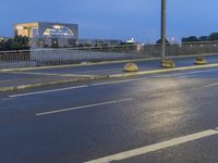 Dawn on the City Streets of Berlin: Water Reflections and Urban Lights