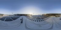 a view of the skating park and the parking lot, as seen through the lens