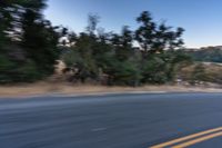 Dawn: Clouds Over Road Surface